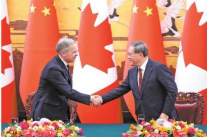 China, Canada vow to enhance bilateral ties Relations: Positive momentum shown since last year
